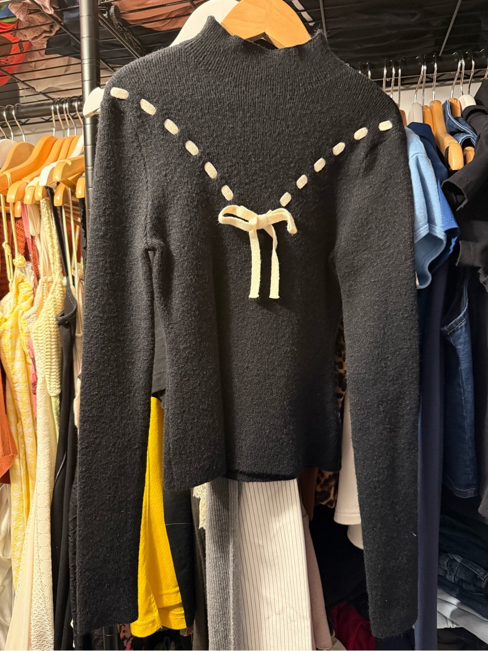 Women's Black Turtleneck Sweater with Cream Bow Detail